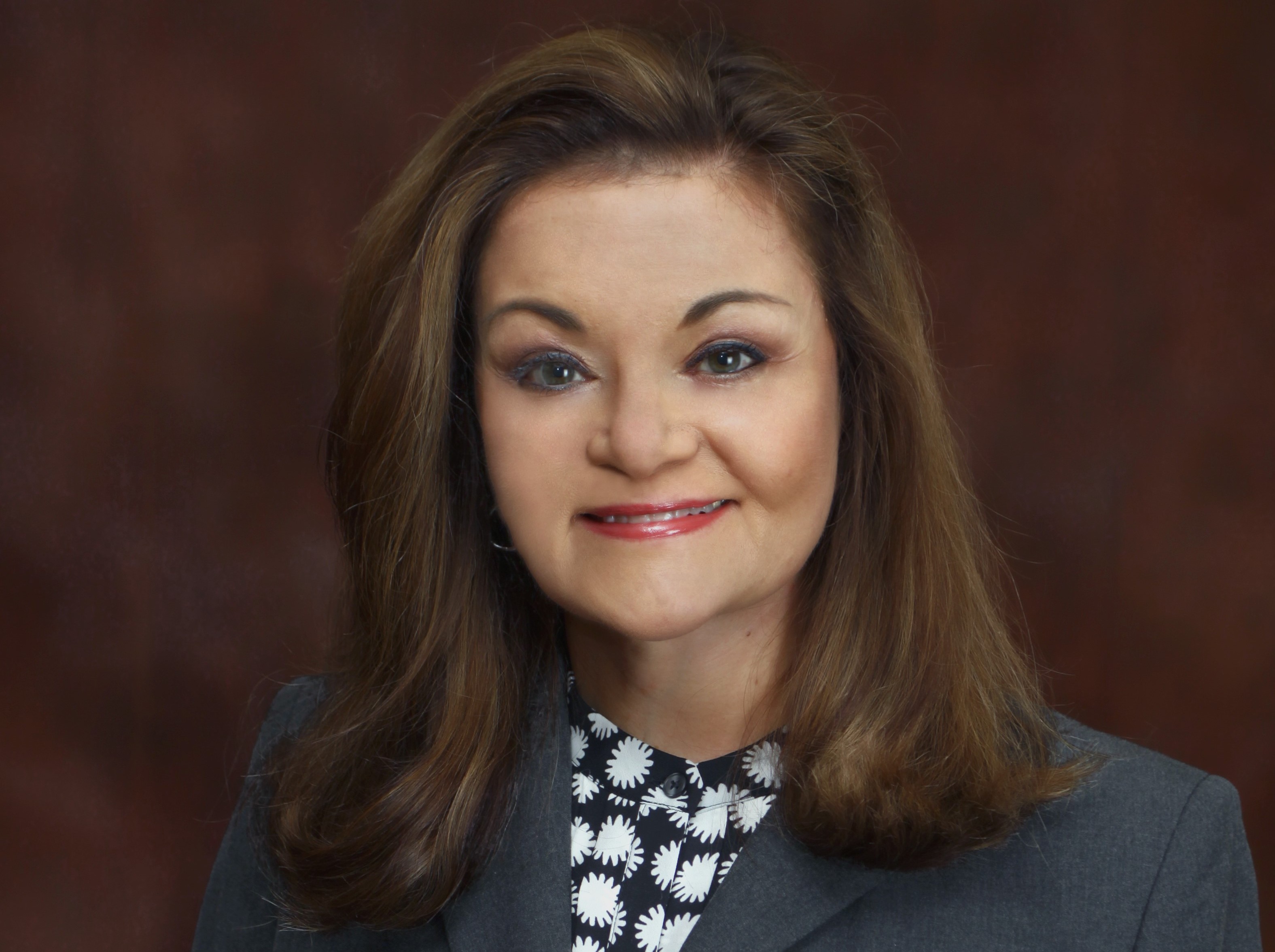 A headshot of Assistant Professor Maggie Ozan Rafferty